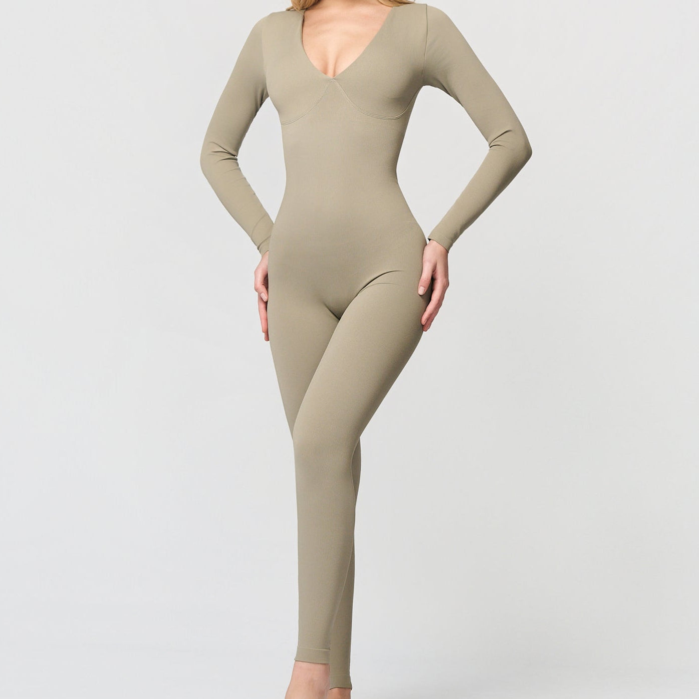 Shaping jumpsuit with V-neckline