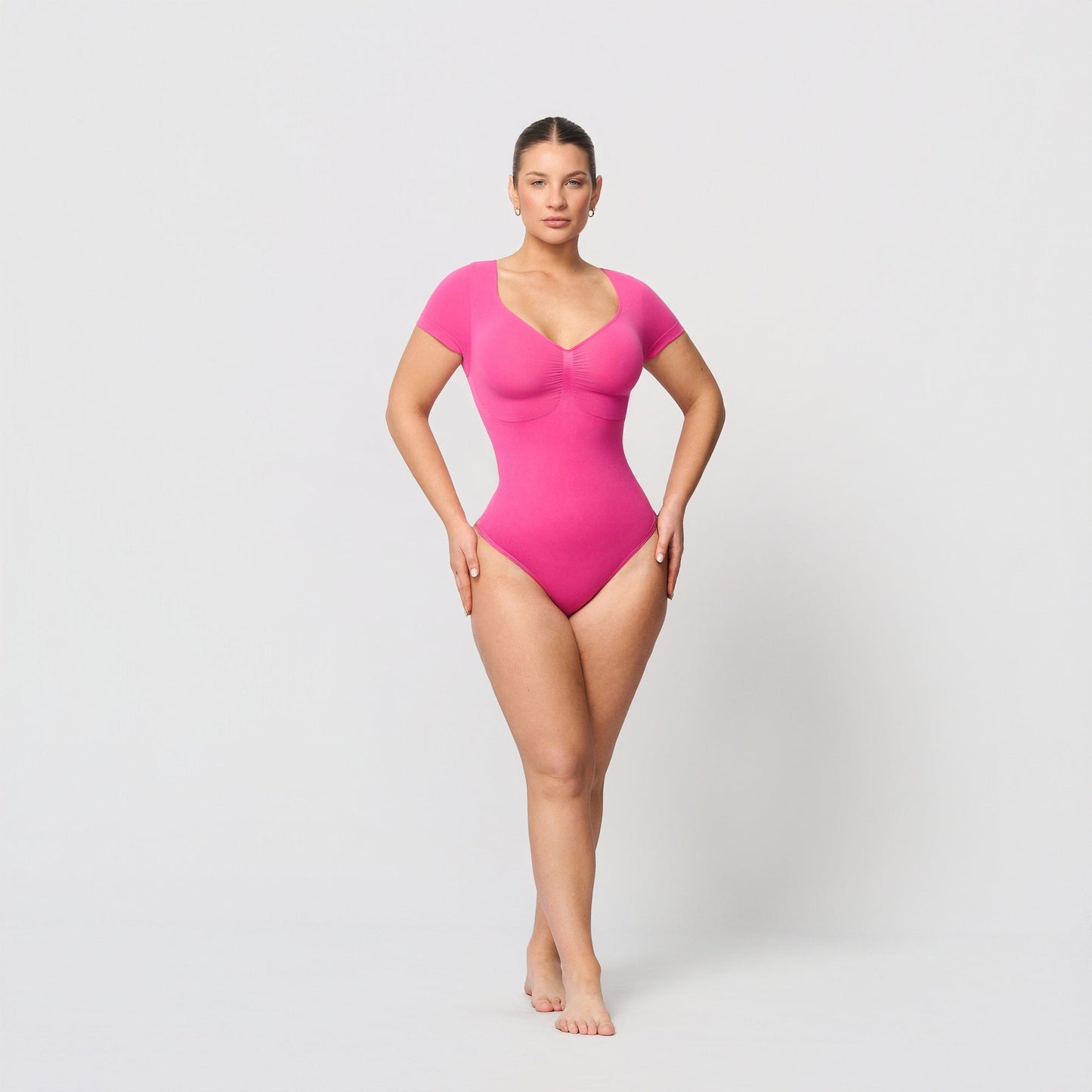 Shaping body with short sleeves