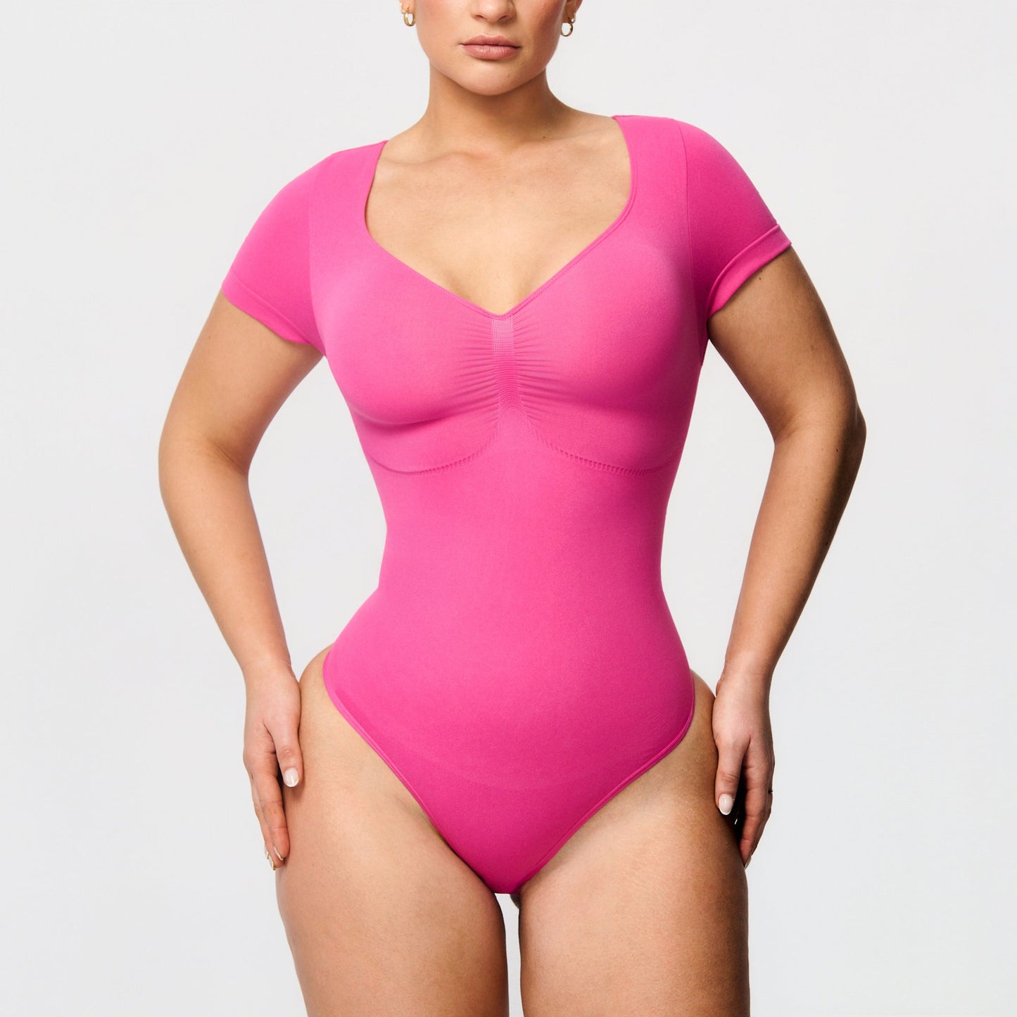 Shaping body with short sleeves