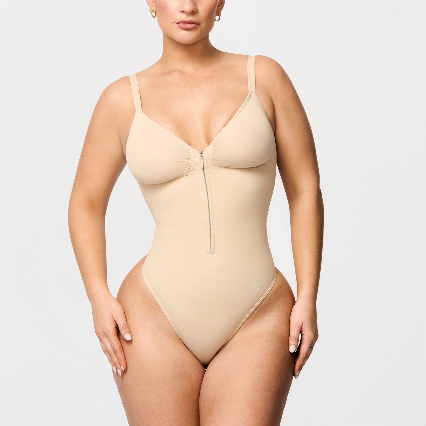 Shaping body with zipper and hooks