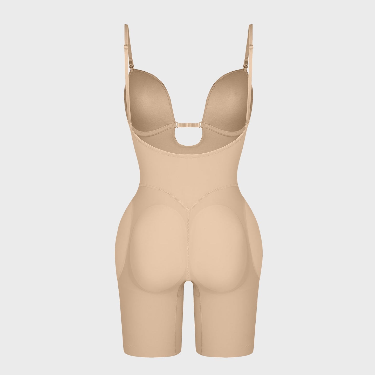 Shaping body with removable padding