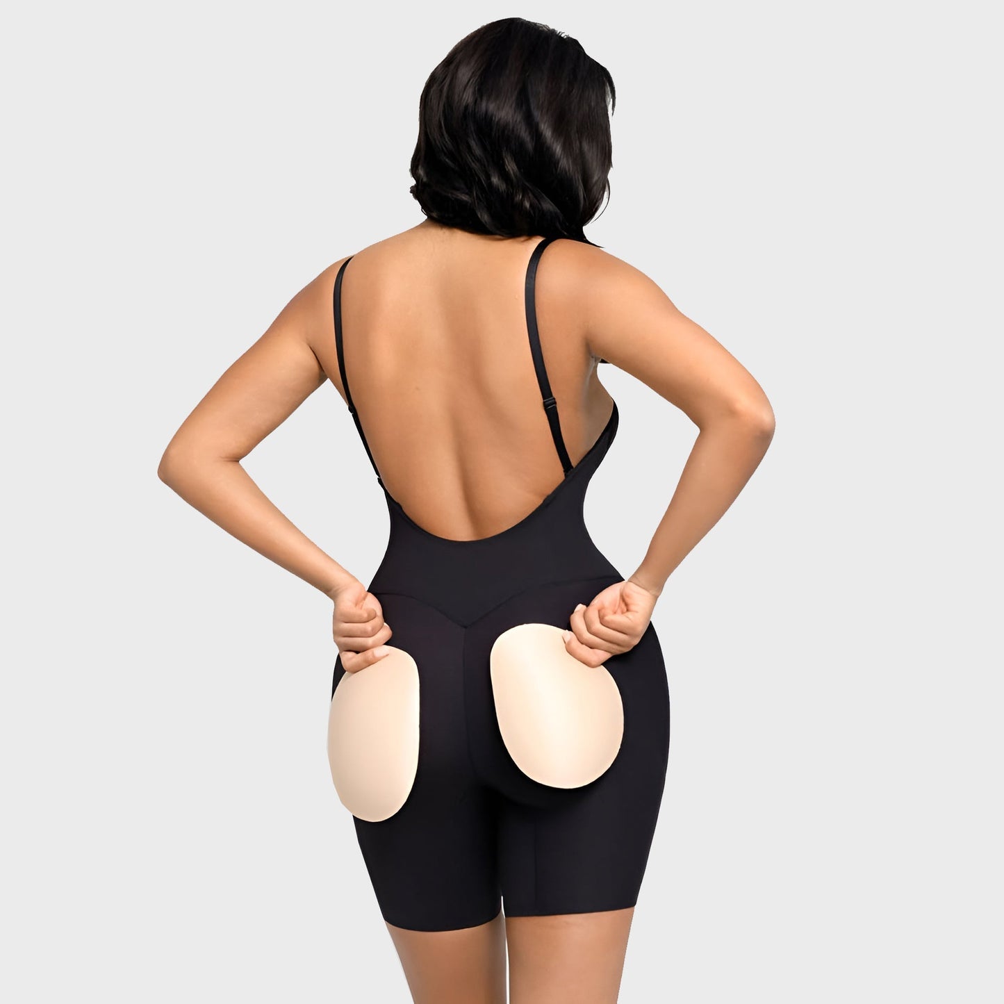 Shaping body with removable padding