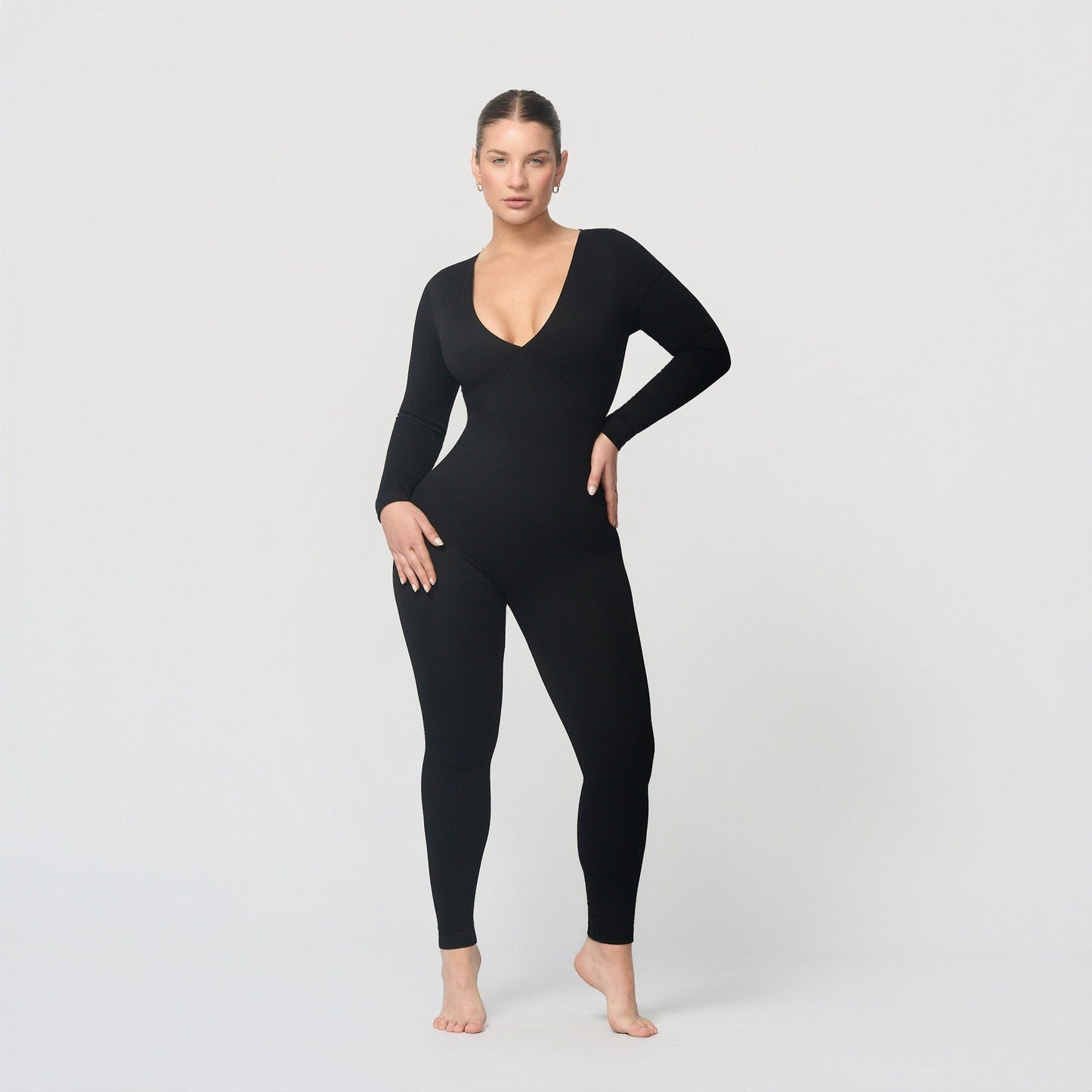 Shaping jumpsuit with V-neckline