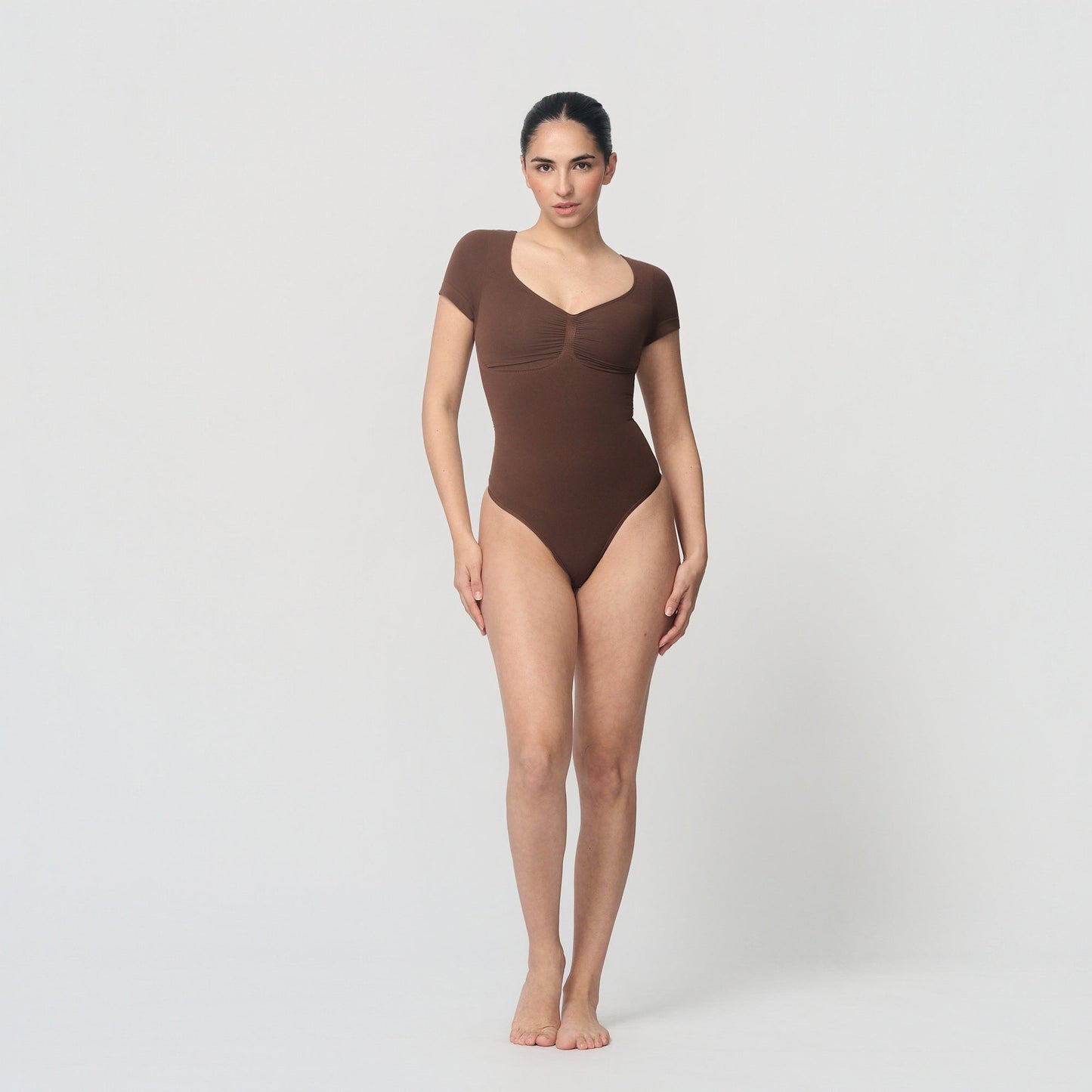 Shaping body with short sleeves