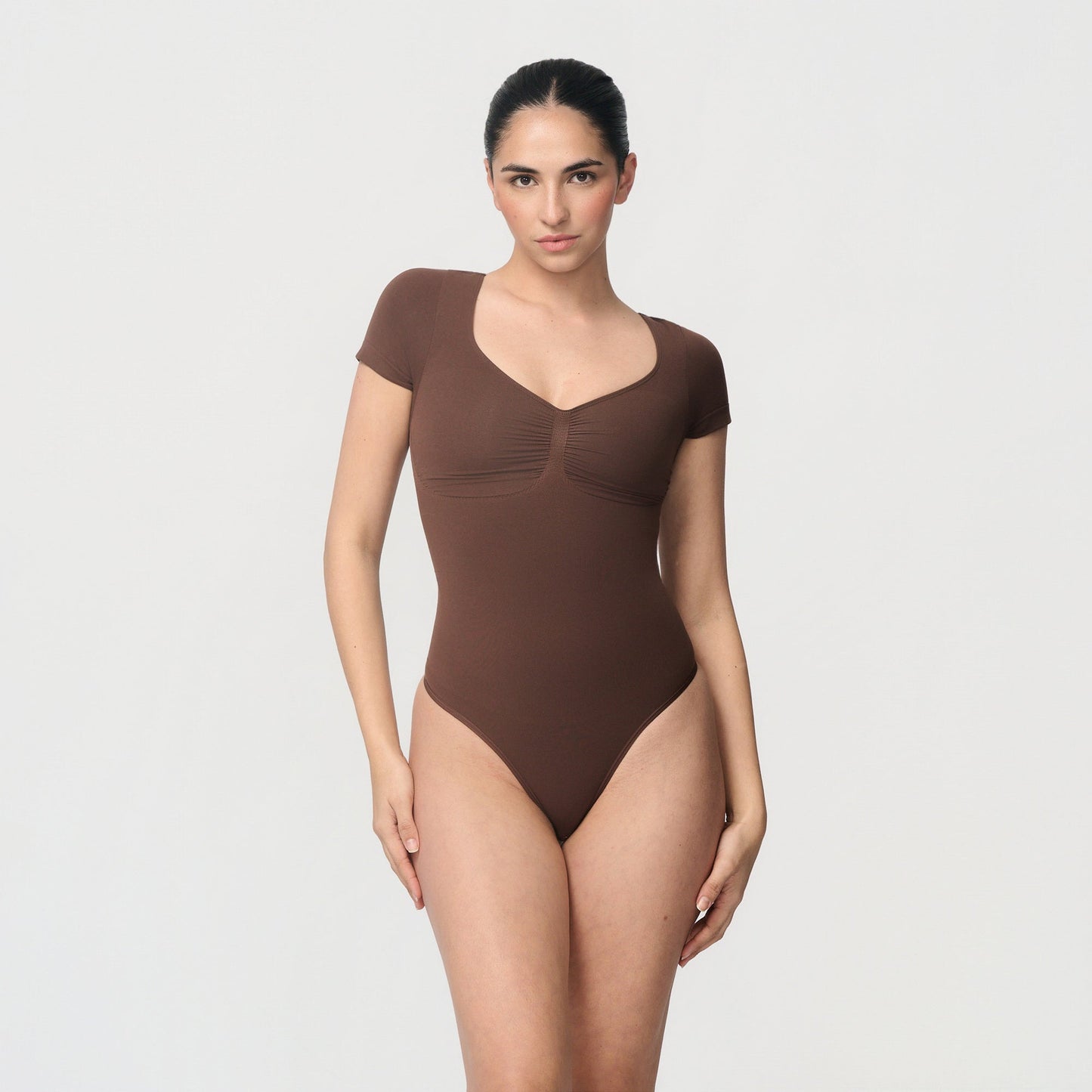 Shaping body with short sleeves